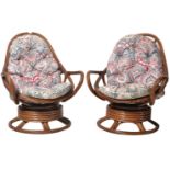 MATCHING PAIR OF RETRO WICKER / CANE SWIVEL EGG ARMCHAIR