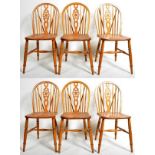 MATCHING SET OF SIX VINTAGE WHEEL BACK DINING CHAIRS