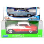 TWO 1/18 SCALE BOXED DIECAST MODEL CARS