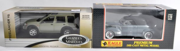 TWO ASSORTED 1/18 SCALE BOXED DIECAST MODEL CARS