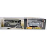 TWO ASSORTED 1/18 SCALE BOXED DIECAST MODEL CARS