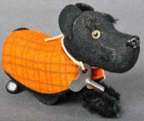 VINTAGE 1950S GERMAN SCHUCO CLOCKWORK TINPLATE SCOTTIE DOG TOY