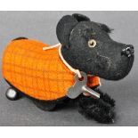 VINTAGE 1950S GERMAN SCHUCO CLOCKWORK TINPLATE SCOTTIE DOG TOY