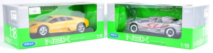 TWO ORIGINAL WELLY MADE ' NEX MODELS ' 1/18 SCALE DIECAST CARS