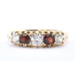 18CT GOLD DIAMOND & GARNET FIVE STONE RING