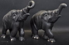 PAIR OF EARLY 20TH CENTURY EBANY ELEPHANTS