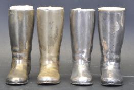 COLLECTION OF FOUR 20TH CENTURY WHITE METAL SPIRIT MEASURES