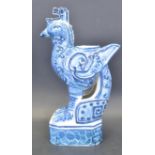 20TH CENTURY CHINESE REPUBLIC BLUE AND WHITE CERAMIC BIRD