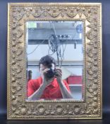 EARLY 20TH CENTURY BRASS & BEVELLED GLASS WALL MIRROR