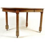 1920S SOLID OAK OVAL EXTENDING DINING TABLE