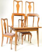 20TH CENTURY WALNUT DRAW LEAF DINING TABLE AND CHAIRS