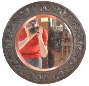 1912 OAK CARVED FRAME CIRCULAR WALL MIRROR