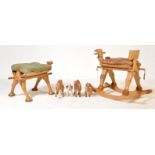 COLLECTION OF CAMEL STOOLS AND CAMEL FIGURINES