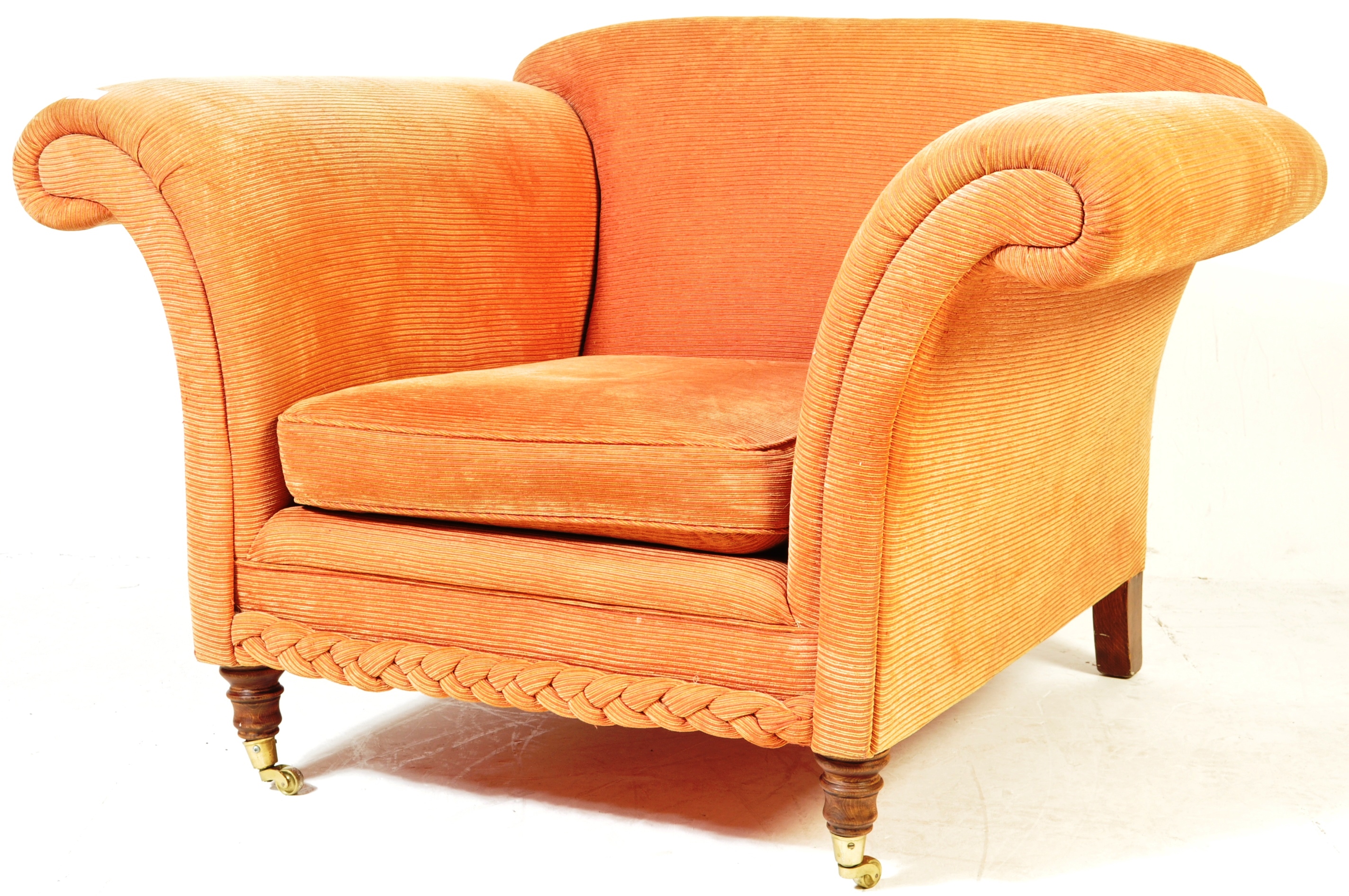 20TH CENTURY HOWARD AND SONS STYLE ARMCHAIR