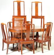 CHINESE HARDWOOD EXTENDABLE DINING TABLE AND CHAIRS
