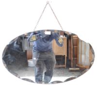 1950’S OVAL BEVELLED GLASS WALL HANGING MIRROR