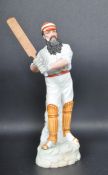 20TH CENTURY BISQUE FIGURINE OF WG GRACE