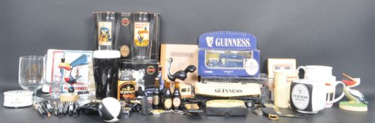 LARGE COLLECTION OF VINTAGE GUINNESS ADVERTISING ITEMS