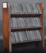 EARLY 20TH CENTURY CIRCA 1920S MINIATURE SHAKESPEARE PLAYS ON BOOKCASE