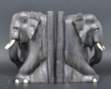 TWO 20TH CENTURY HAND CARVED ELEPHANT BOOKENDS