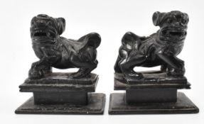 PAIR OF 19TH CENTURY BLACK CHINESE TEMPLE DOG SEALS