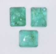 THREE LOOSE EMERALD GEMSTONES