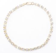 9CT GOLD & DIAMOND LINE BRACELET