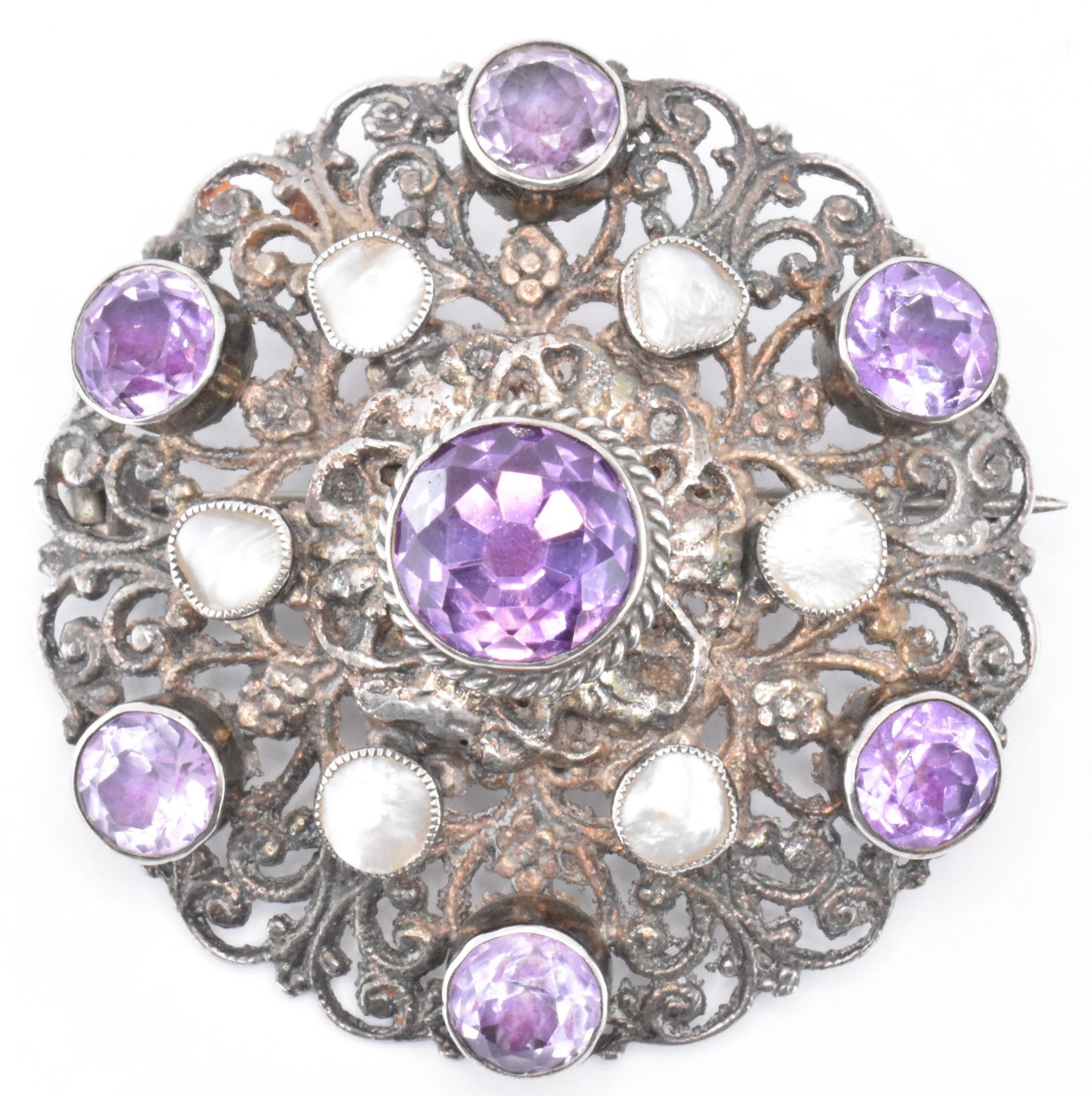 EARLY 20TH CENTURY SILVER AMETHYST & MOTHER OF PEARL BROOCH