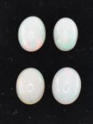 FOUR OVAL OPAL CABOCHONS