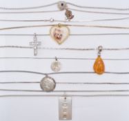 ASSORTMENT OF SILVER PENDANT NECKLACES