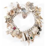 VINTAGE SILVER HALLMARKED CHARM BRACELET