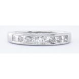 18CT WHITE GOLD & DIAMOND HALF ETERNITY RING