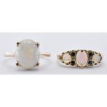 TWO 9CT GOLD & OPAL SET RINGS