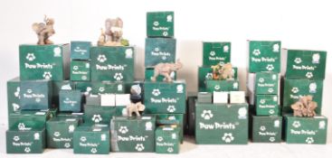 OVER 40 TUSKERS PAW PRINTS COLLECTORS FIGURINES