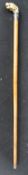 EARLY 20TH CENTURY HAND CARVED IVORY HANDLED WALKING STICK
