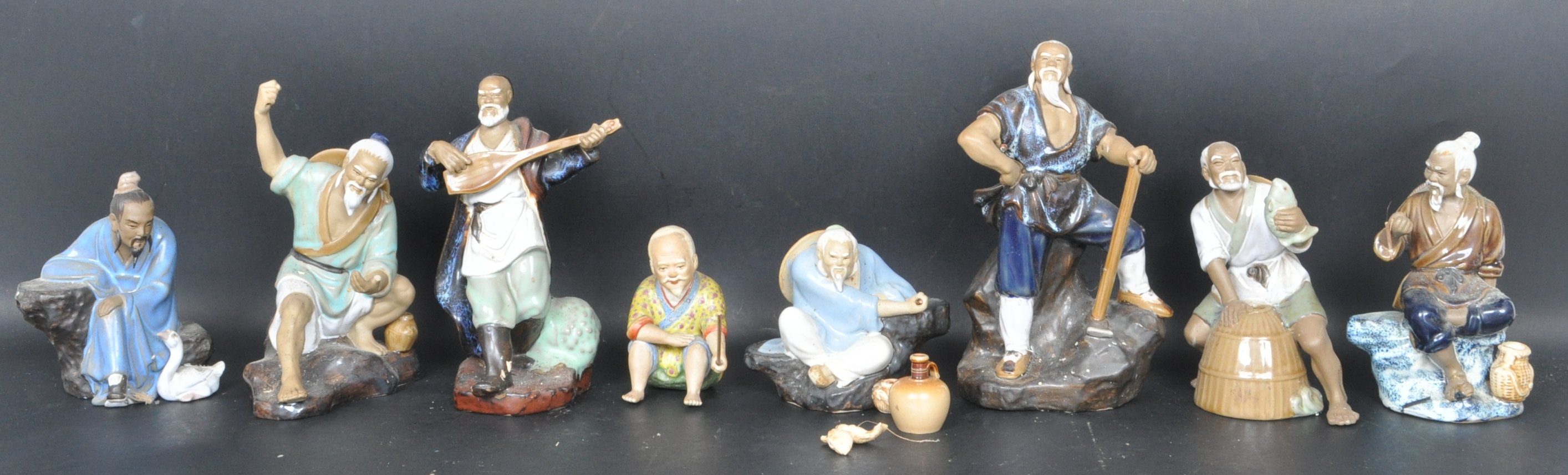 EIGHT CHINESE ORIENTAL CERAMIC PORCELAIN FIGURINES