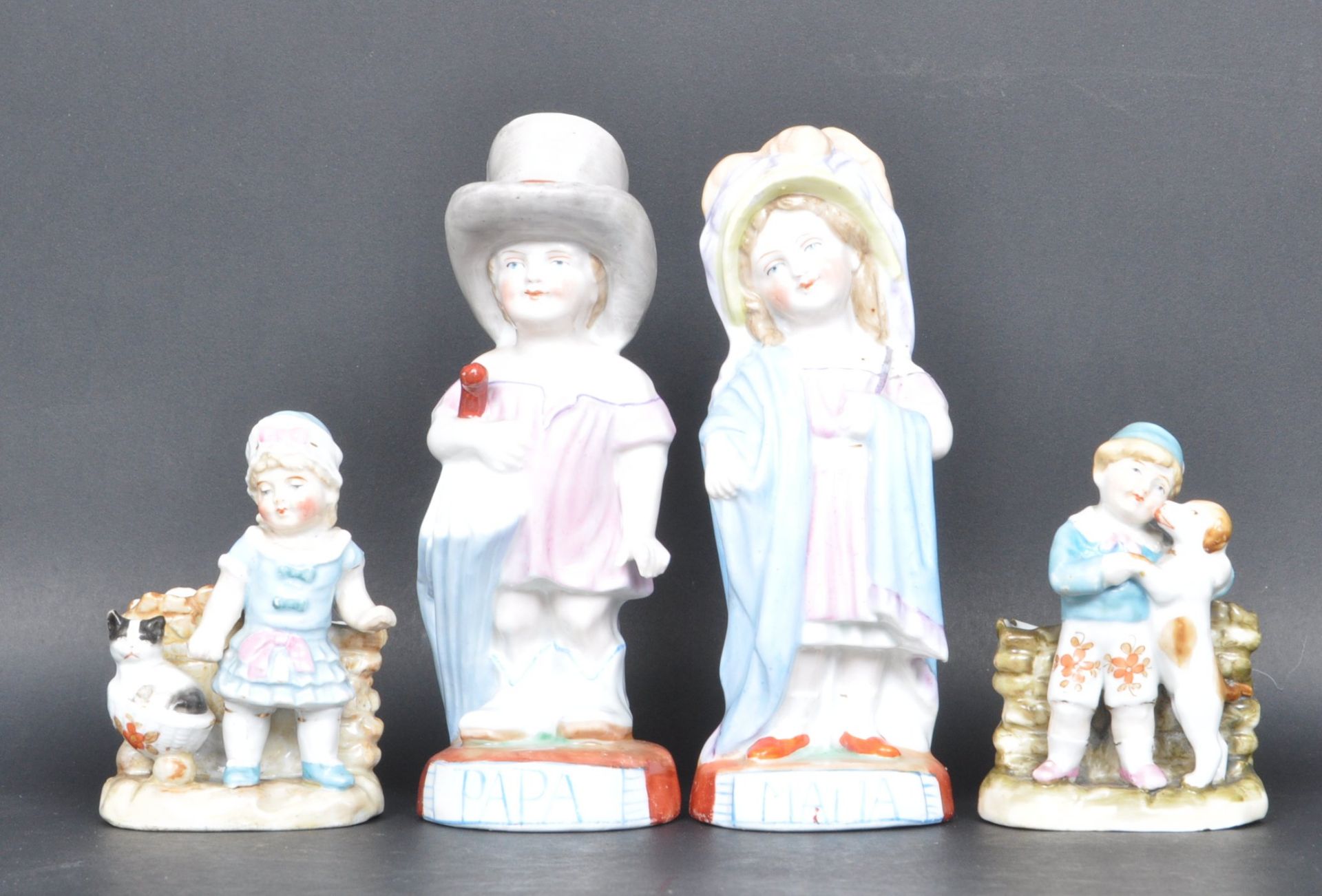 FOUR GERMAN CERAMIC PORCELAIN MATCH HOLDERS