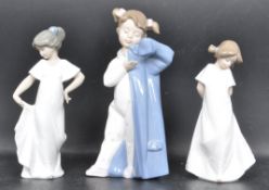 THREE NAO BY LLADRO CERAMIC PORCELAIN FIGURINES - 1110 - 1109 - 1316