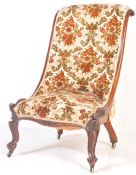 19TH CENTURY VICTORIAN NURSING CHAIR WITH FLORAL UPHOLSTERY