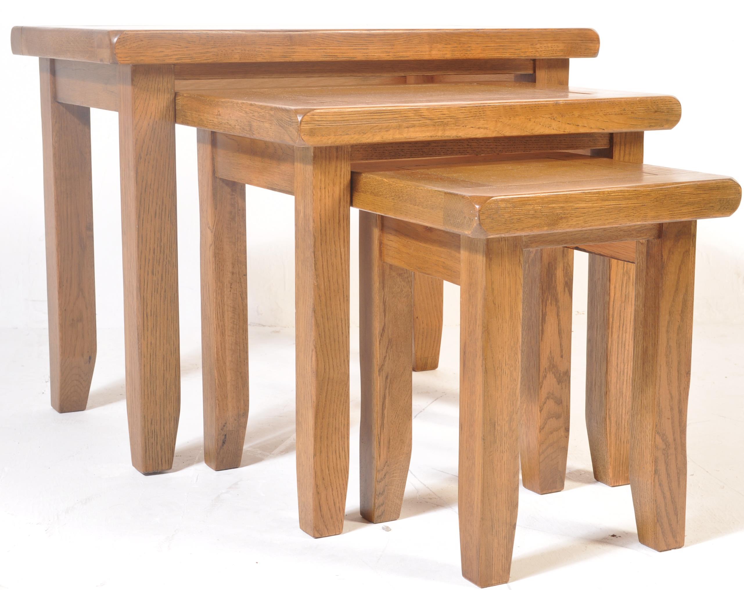 NEST OF CONTEMPORARY OAK GRADUATING TABLES