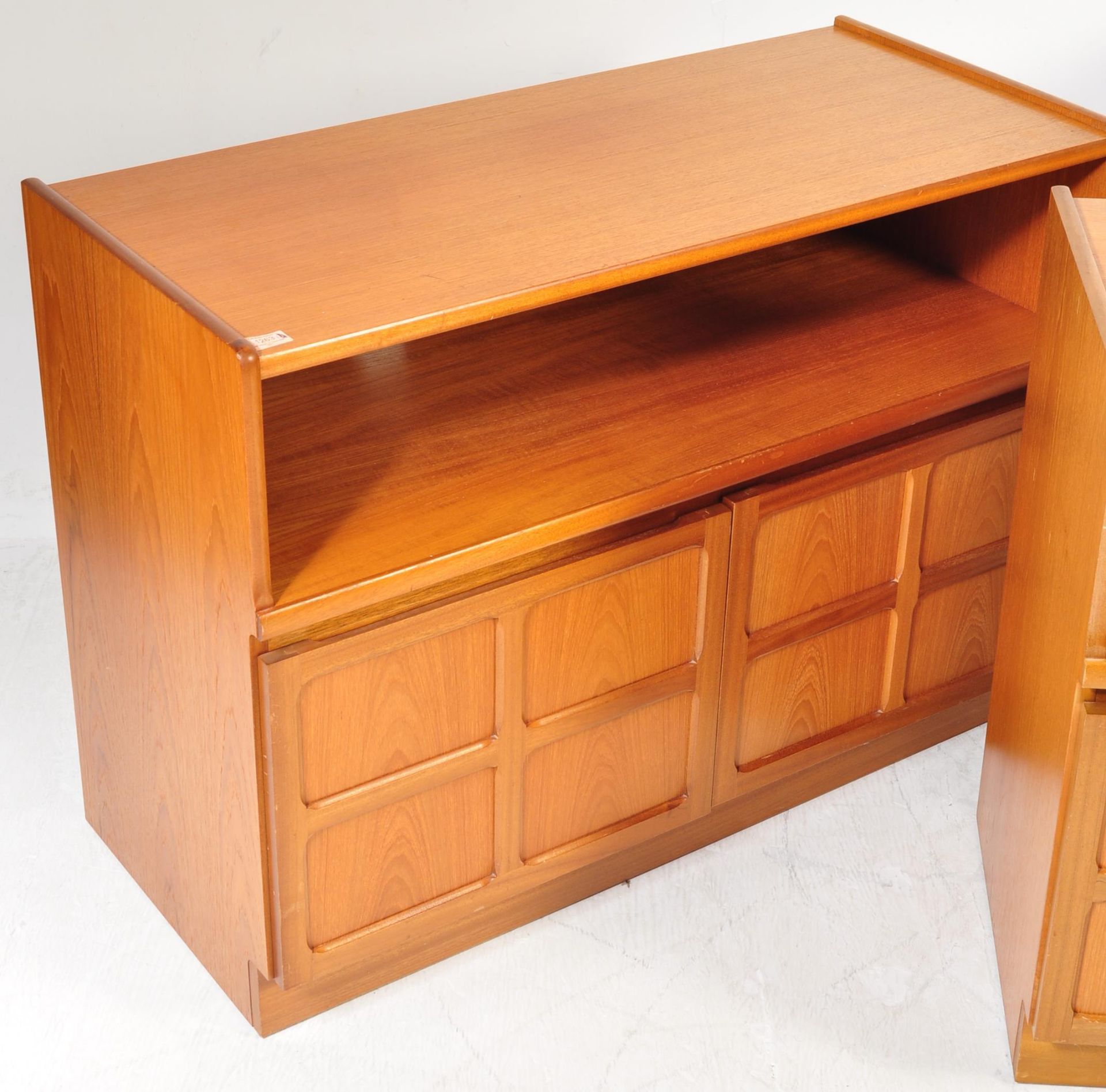 TWO TEAK WOOD LOW ENTERTAINMENT CABINETS AND BEDSIDE CABINET BY NATHAN - Image 3 of 13