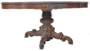 19TH CENTURY ROSEWOOD SERPENTINE CENTRE TABLE