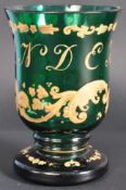 19TH CENTURY BOHEMIAN GREEN GLASS GILDED SOUVENIER BEAKER