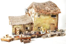 19TH CENTURY PLASTER MODEL OF A FISHERMANS COTTAGE