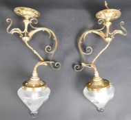 MATCHING PAIR OF ARTS AND CRAFTS BRASS AND GLASS SCONCES