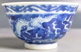 19H CENTURY CHINESE KANGXI MARK BLUE AND WHITE TEA BOWL
