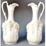 PAIR OF 19TH CENTURY PARIAN WARE JUGS ADORNED WITH GRAPES