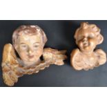 TWO HAND CARVED BACCHANALIAN CHERUBS