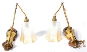 MATCHING PAIR OF ARTS AND CRAFTS BRASS AND GLASS SCONCES