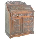 19TH CENTURY CARVED OAK GREEN MAN BUREAU